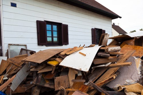 Family using a skip for home renovation waste